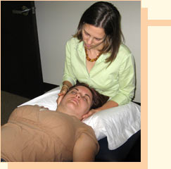 Michele McCarthy performing therapy on a client